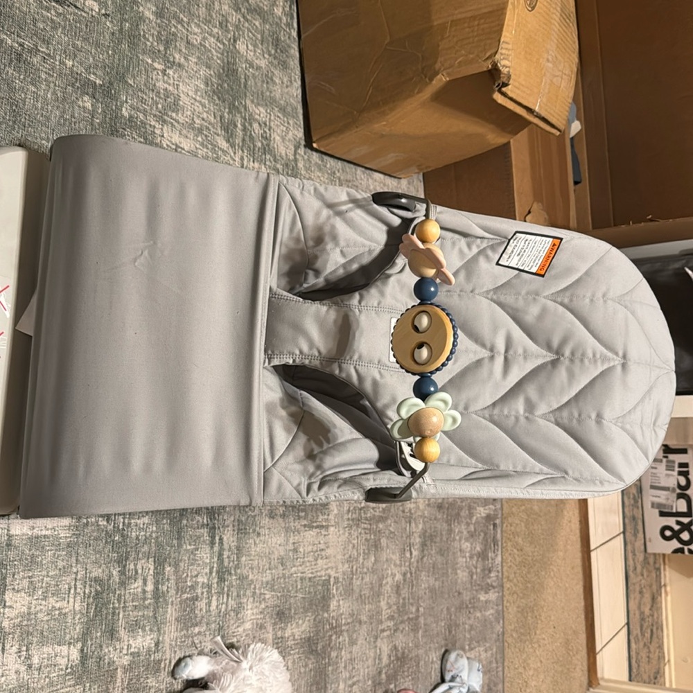 Very gently used Babybjorn bouncer with toy bar